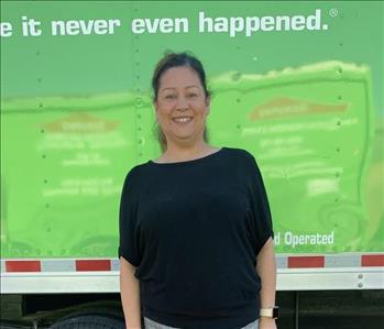 Lisa in front of servpro truck